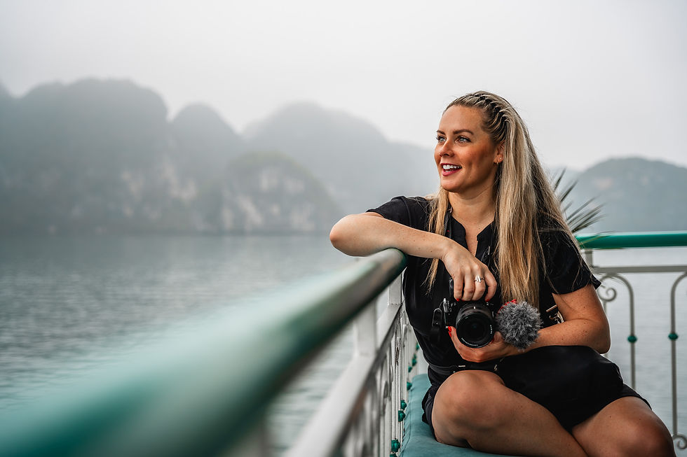 Lady looking out from boat in Halong Bay, Vietnam