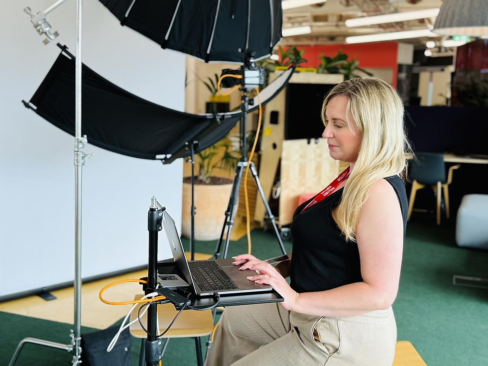 A Photography team member analysing images