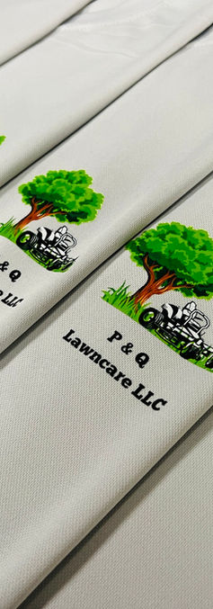 Custom printed business shirts with a business logo on them