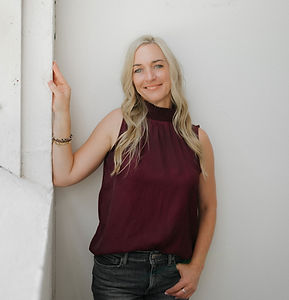 Amy headshot wall jeans.jpg