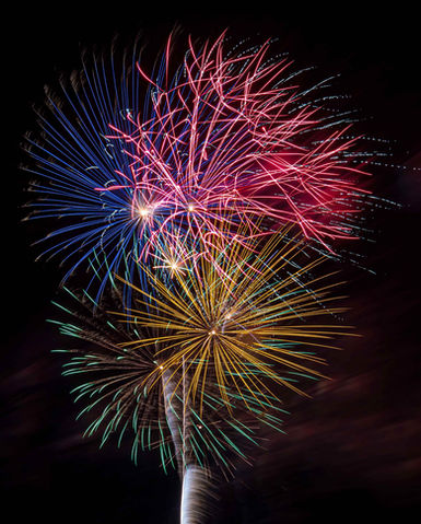 Timestacked photo of WaunaBoom fireworks lighting up the night sky