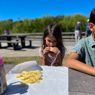 Family enjoying a picnic break during a day trip to Shark Valley in Everglades National Park