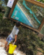 kid looking at the map for Bowman's Beach in Sanibel Island Florida