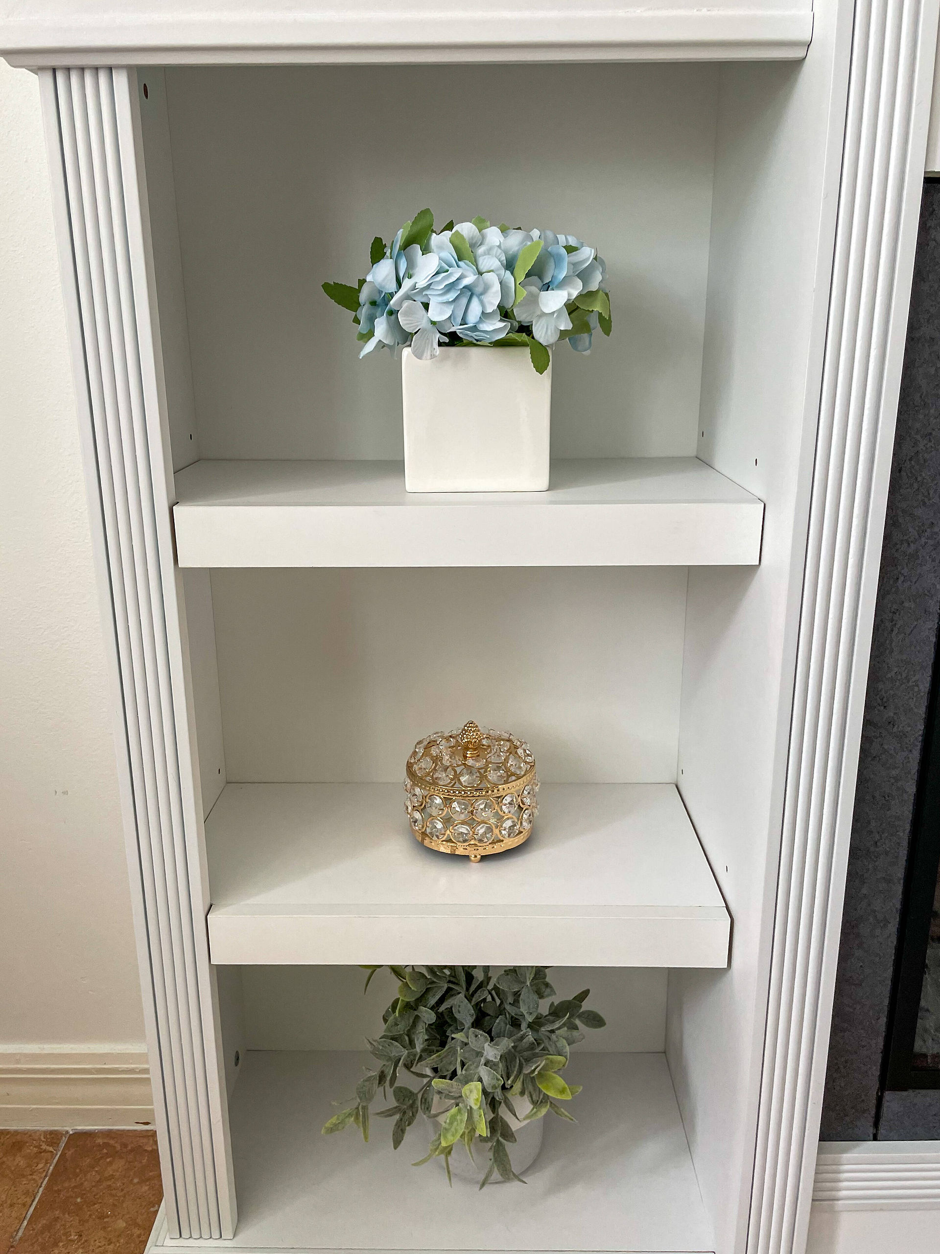 White, blue and gold home decor pieces