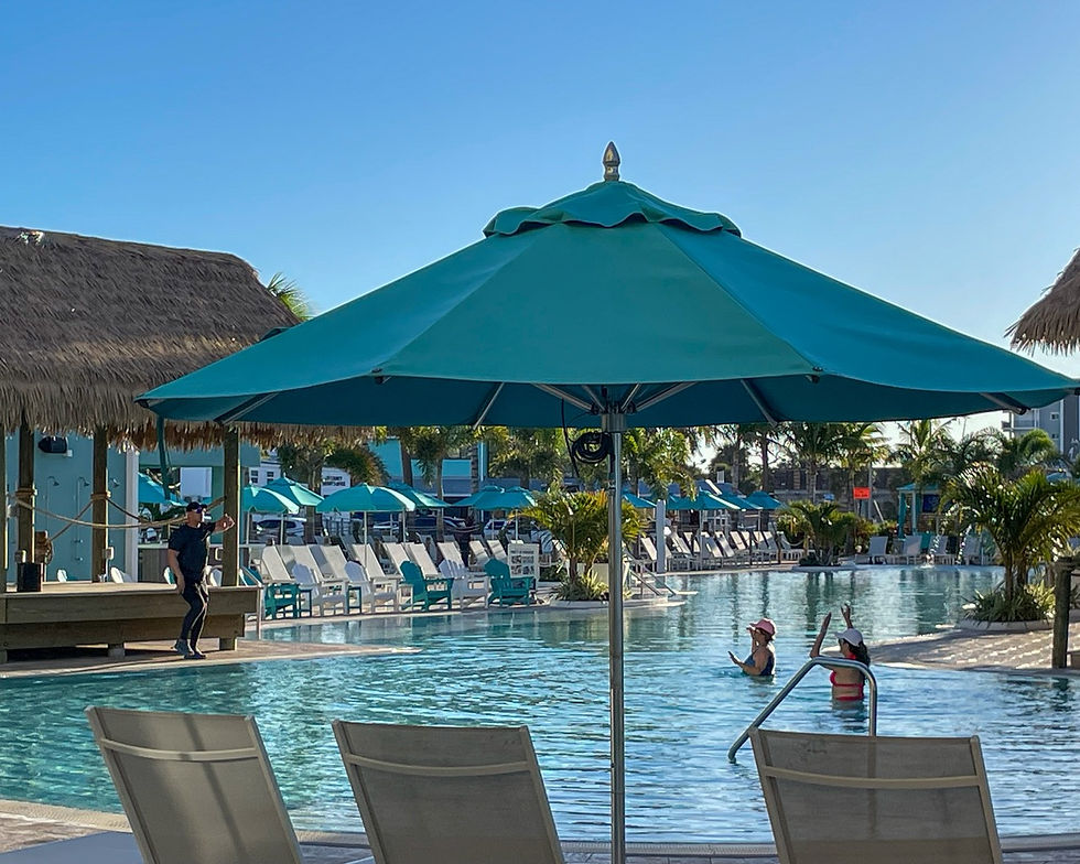 Guests enjoying the Fins Up! Beach Club at Margaritaville Fort Myers Beach