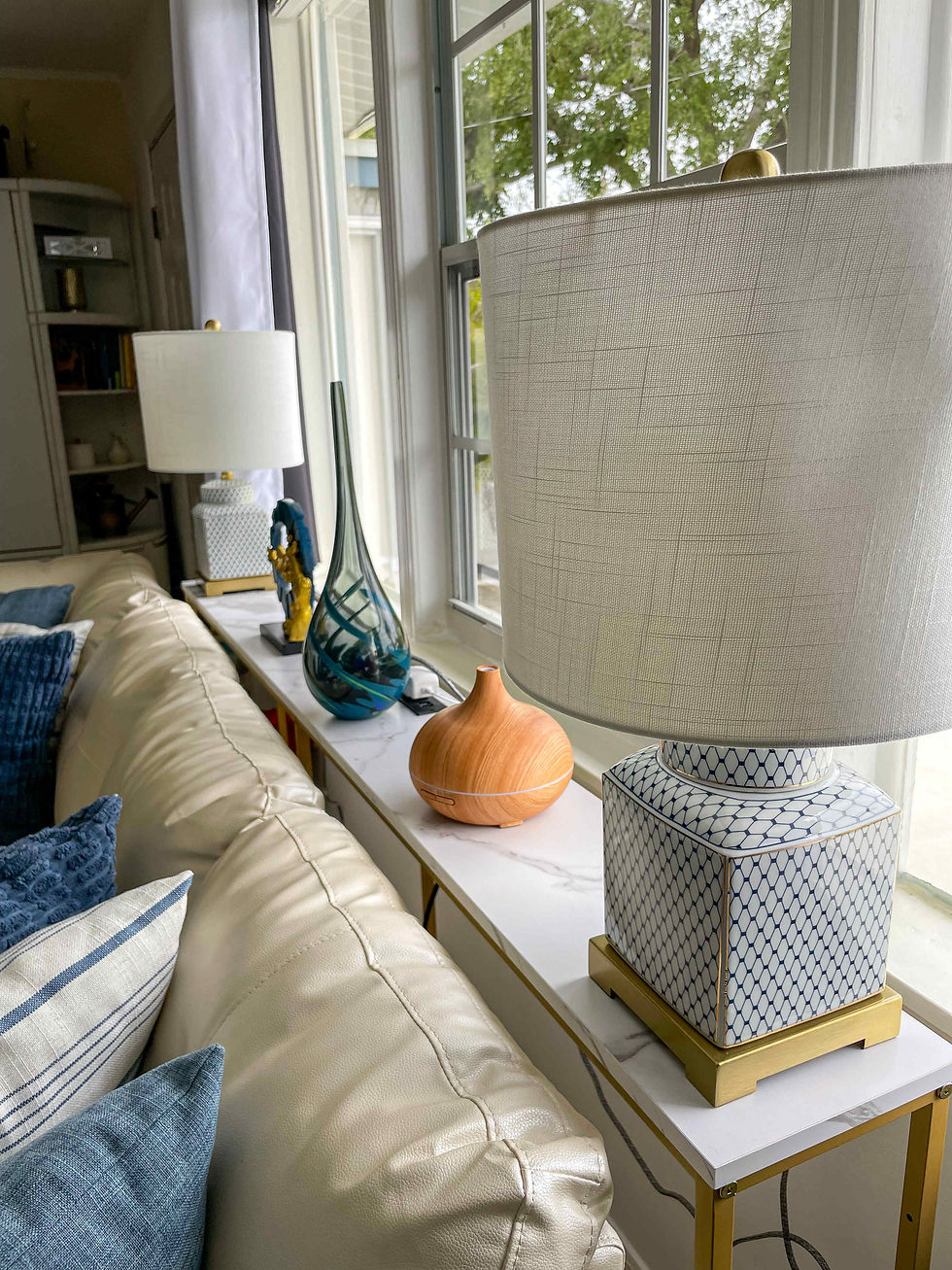 Table behind a couch