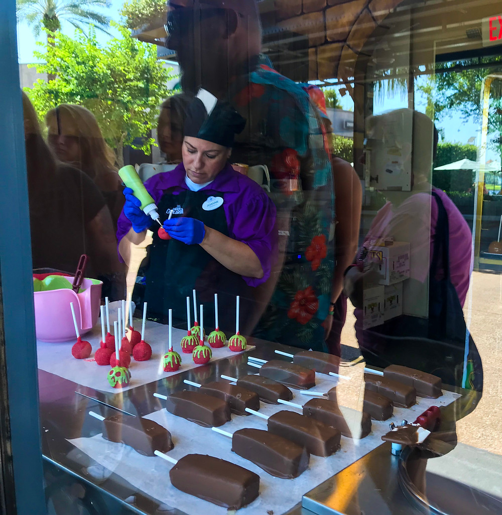Bonbon maestros at work at Disney's candy cauldron at Disney Springs