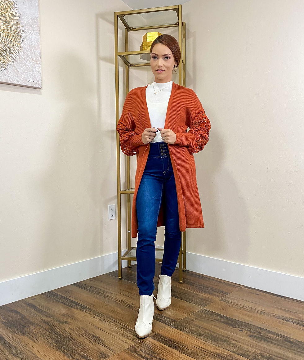 Jeans and burnt orange cardigan