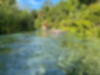 two people in a tube floating down the rock springs at Kelly Park in Apopka.