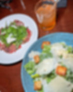 carpaccio and caseser salad with mandarin drink at JWB grill at Fort Myers Beach