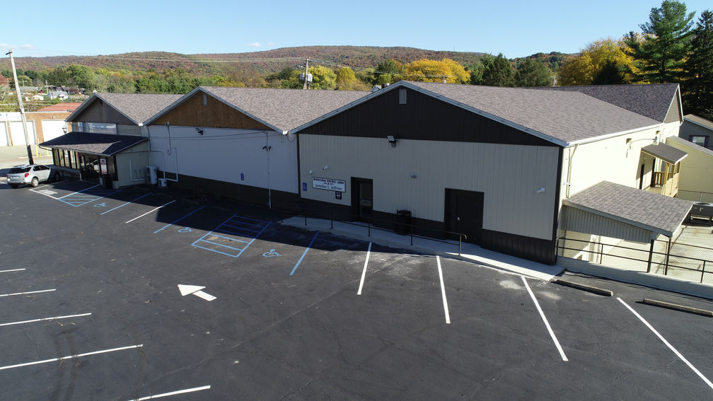 Brown and white plaza building.