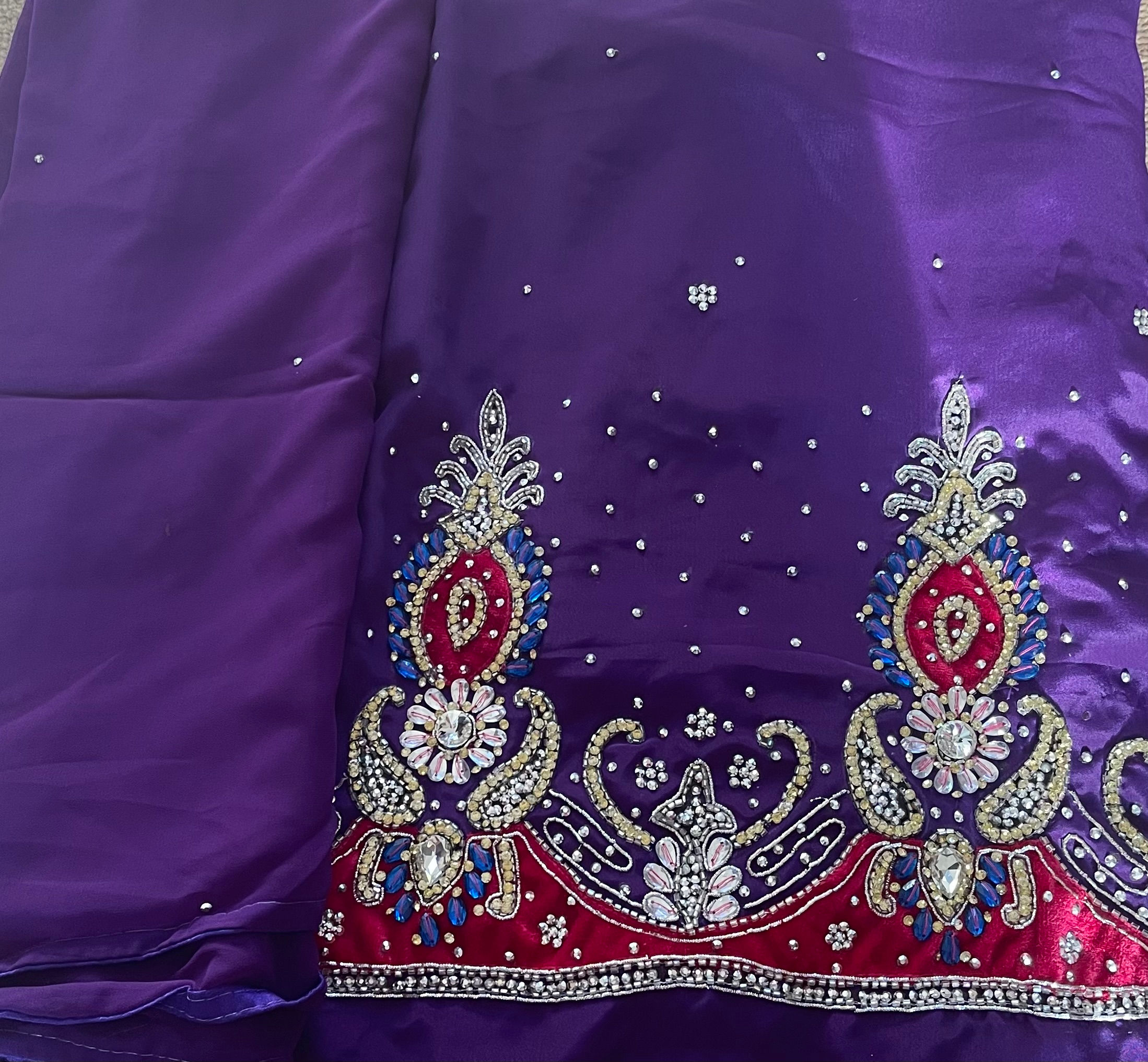 Purple suit with  silver stones