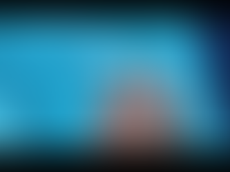 Fingers with wrinkled skin underwater in a pool. Bright blue water reflects sunlight, creating a serene, summery atmosphere.