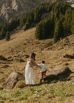 Parents and children exploring the mountains during a family photoshoot near Lucerne, Switzerland