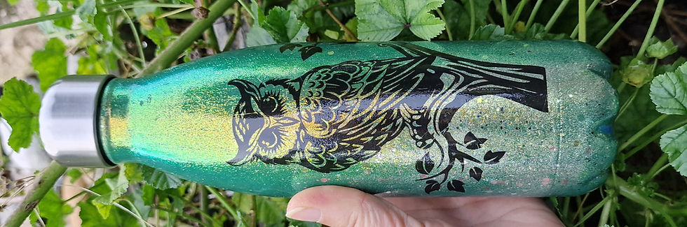 Grüne Glitzerflasche mit Eule