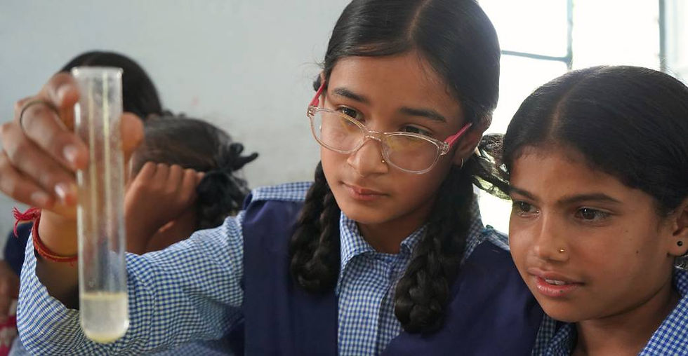 Hands-on learning environment with children exploring educational activities through experiments, observation, and interactive experiences.