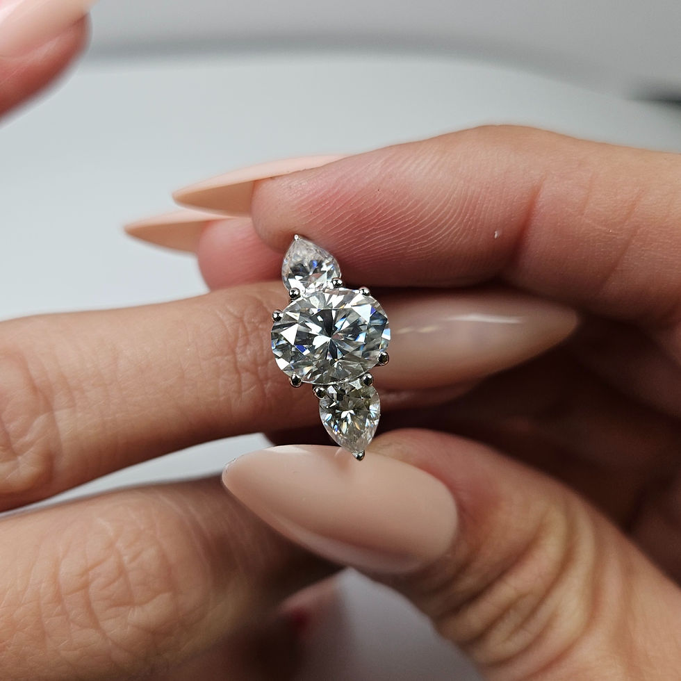 Three stone Oval Engagement Ring