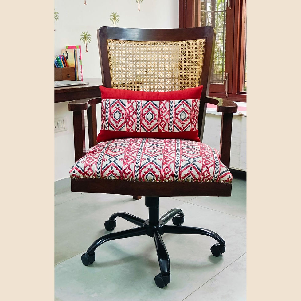Refurbished wooden swivel chair with cane backrest and red jacquard seat - Re:Thadi, Delhi