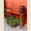 Thumbnail: Refurbished solid wood console table with mirrored legs, styled with indoor plants – Re:Thadi, Delhi