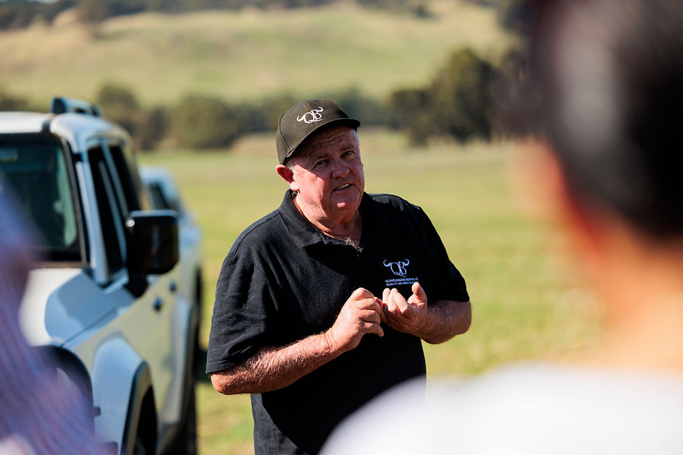 A man speaking to a group of people