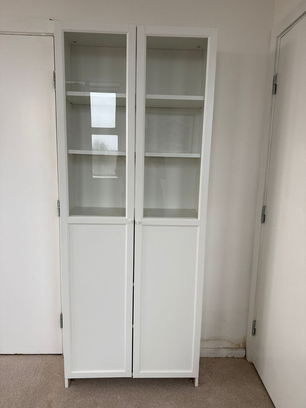 Thumbnail: IKEA BILLY Bookcase with two doors, white, in good condition.  