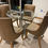 Thumbnail: Round Glass Dining Table Set with 4 leather Chairs, in good condition.
