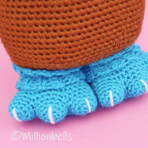 Thumbnail: Monster feet slippers in blue, crocheted amigurumi style