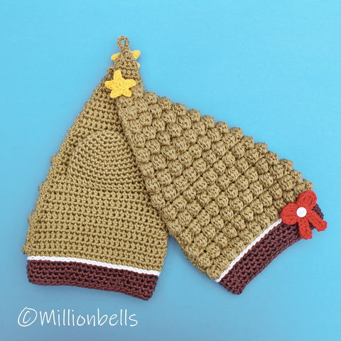 Thumbnail: Star and bow on crocheted Christmas tree oven mitts
