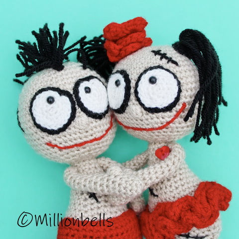 Thumbnail: Crochet voodoo dolls holding eachother