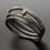 Thumbnail: Silver ring with a yellow stone RC Studio Jewelry on a dark surface.