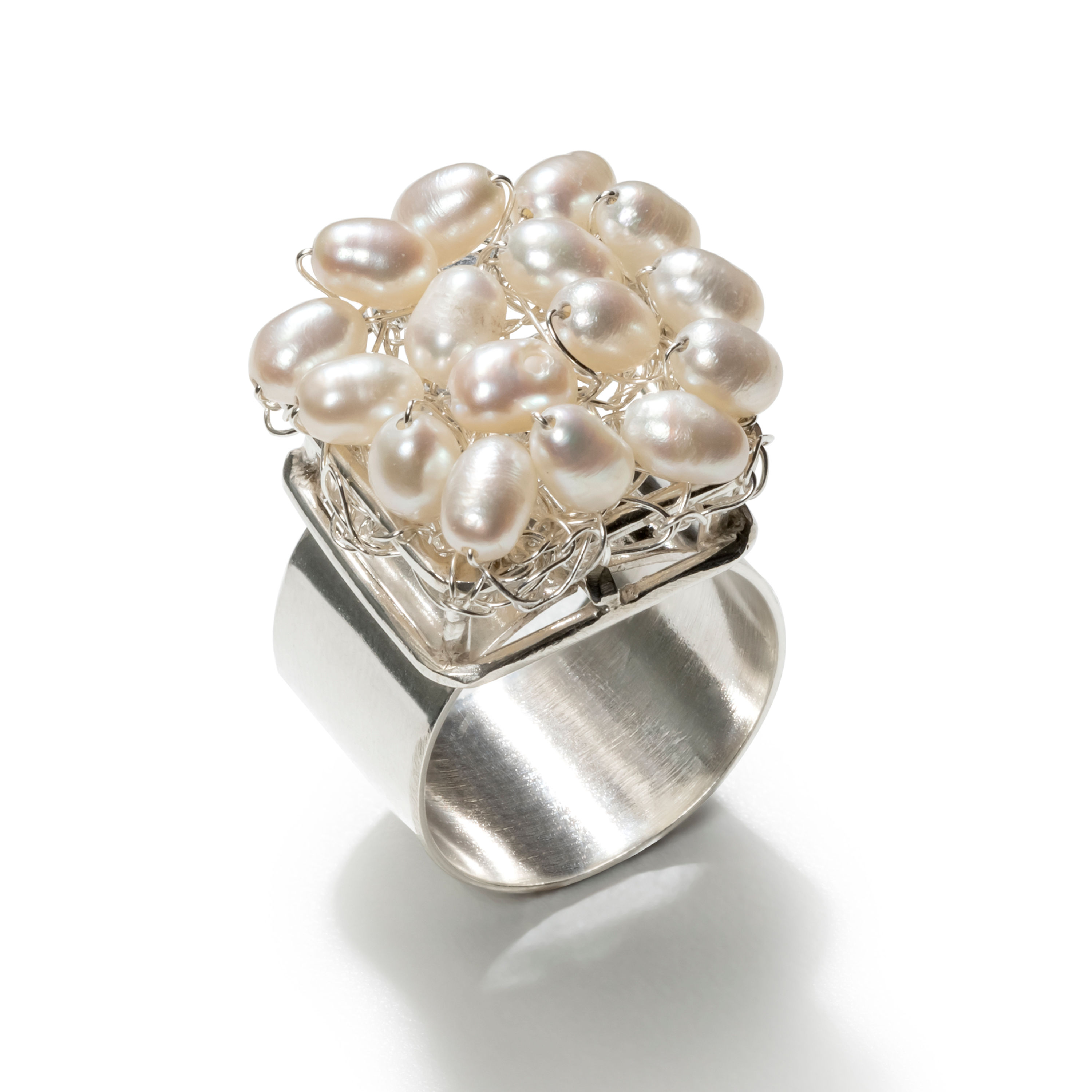 Silver ring with cluster of pearls, RC Studio Jewelry, on white background.