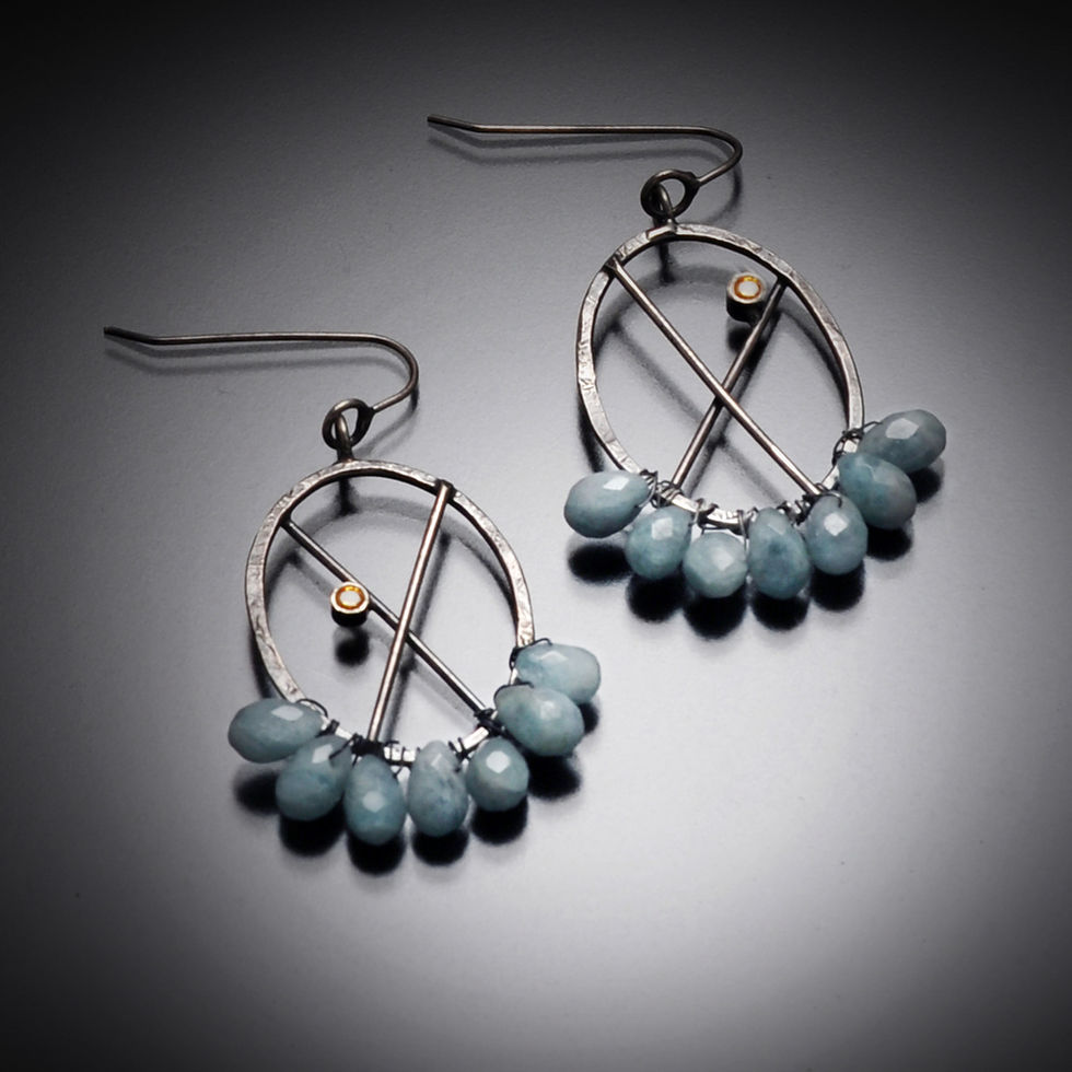 Elegant silver earrings with blue gemstones. RC Studio Jewelry