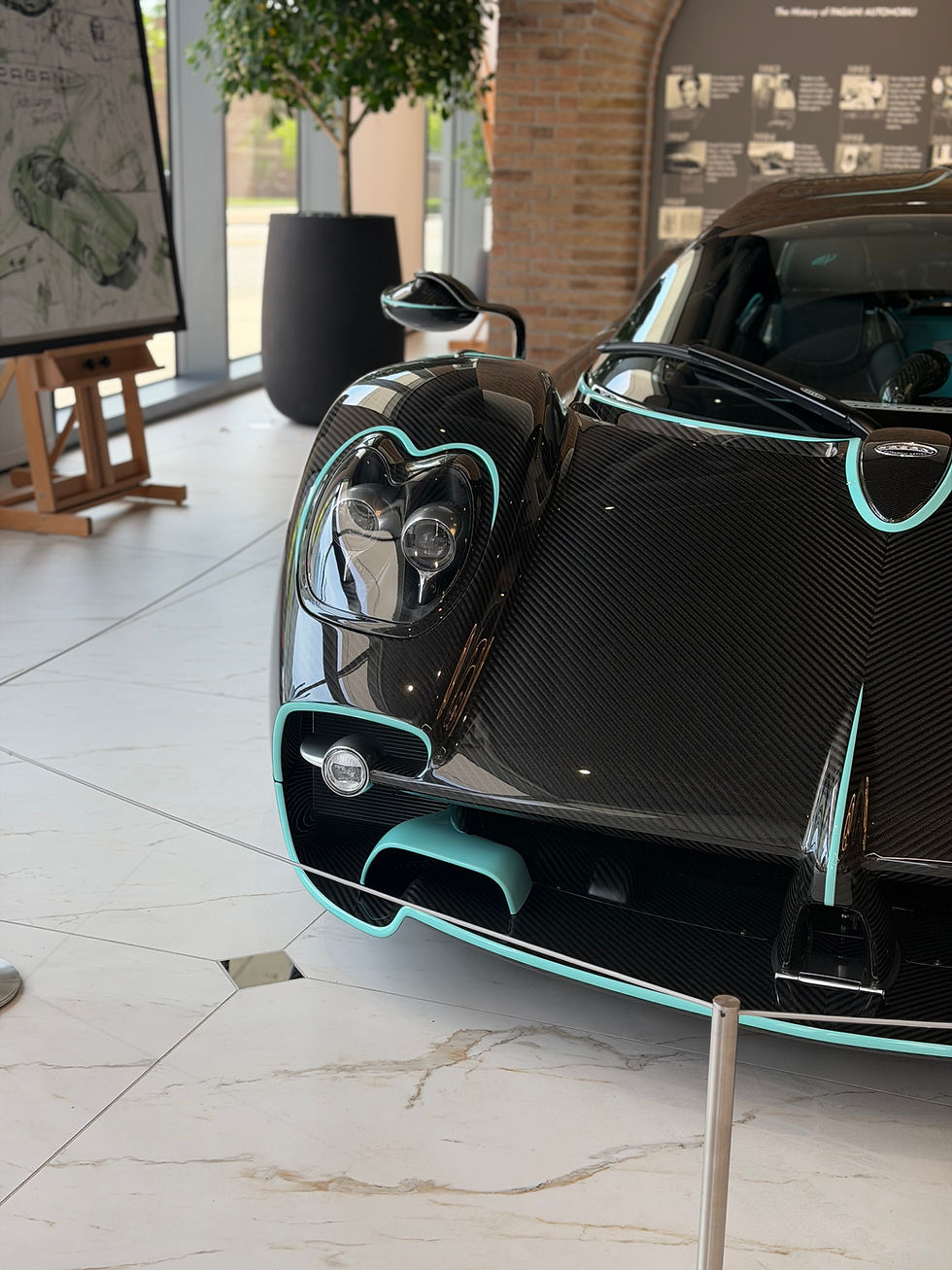 Black Pagani Utopia with exposed carbon fiber accents and luxury performance design