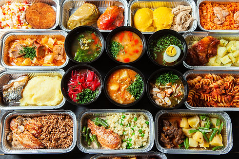 Business lunch in eco plastic container ready for delivery.Top view. Office Lunch boxes wi