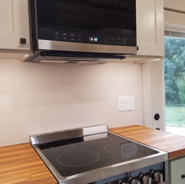 Butcher block counter tops tiny house.