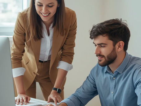 Leader and employee reviewing workload together in a trauma-informed workplace