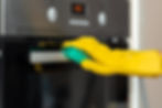 woman-39-s-hand-in-yellow-glove-cleaning-door-of-2025-02-24-16-39-06-utc.jpg