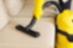 woman-cleaning-sofa-with-yellow-vacuum-cleaner-co-2024-10-18-07-56-08-utc.jpg