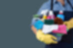 Person holding cleaning supplies