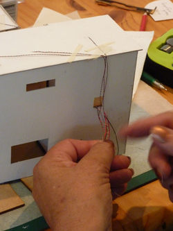 80.burn back the wires to strip down to copper.JPG