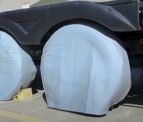 RV tires properly covered to winterize them against UV damage.