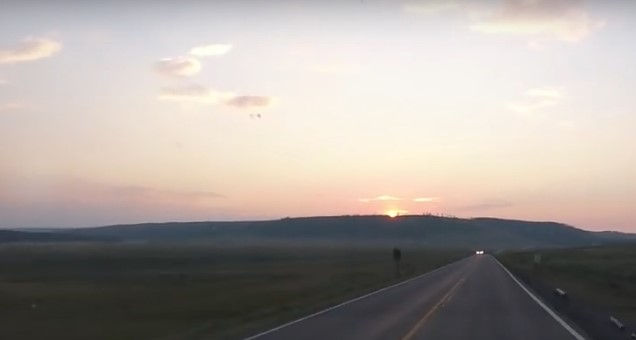 Sunset over Yellowstone's Hayden Valley while driving