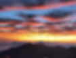 A beautiful sunset over Maui seen from the summit of Haleakala on an exper guided tour.