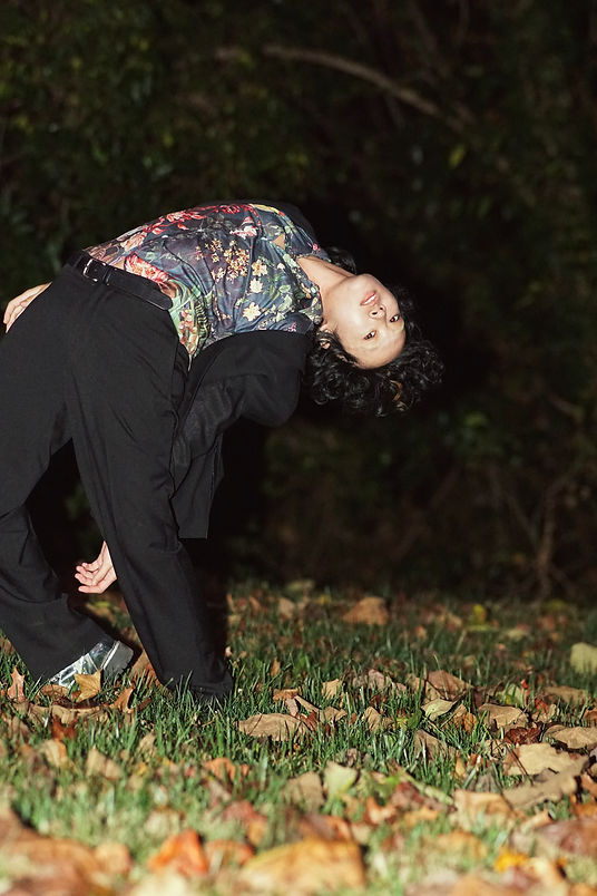 Lee Baladejo in an back bend in the forest photo by Daniel Rosales