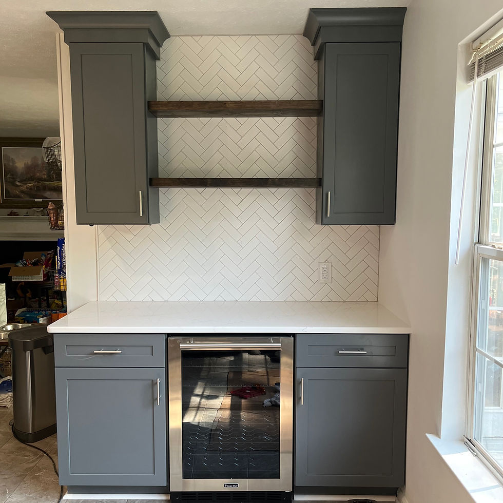 Gray kitchen with white quartz countertops