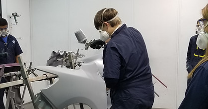 student doing project in automotive collision repair