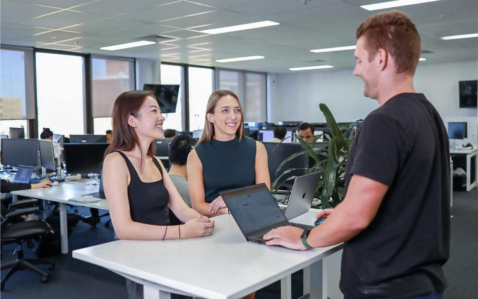 Technology team collaborating in a modern Australian workplace