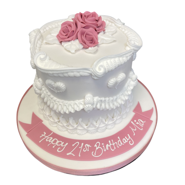 A beautifully decorated cake with intricate and elaborate piping design, perfect for special occasions and celebrations.