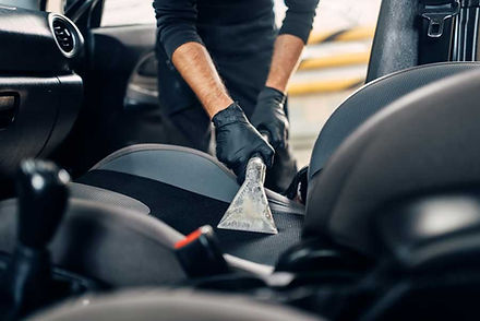 dry-cleaning-of-car-interior-with-vacuum-cleaner-TUZA9QS.jpg