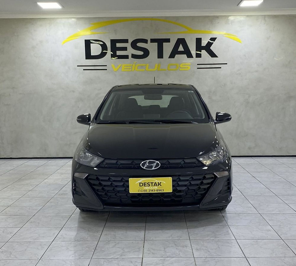 Foto de frente do JEEP Compass com logo da Destak Veículos na parede ao fundo